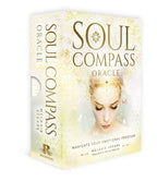 Soul Compass Oracle deck box by Melanie Spears, featuring a soft cream and gold design with a central illustration of a woman's face and gold lettering, shown on a clean white background.