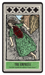 Tarot card featuring 'The Empress' with a woman in a green dress and red shawl, standing under a lightning bolt.