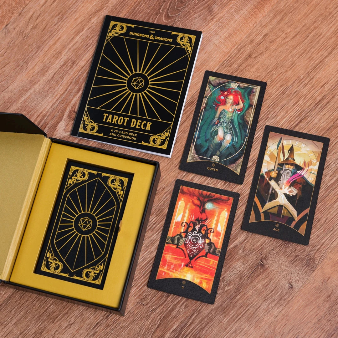 Open tarot card deck with cards spread out on a wooden surface