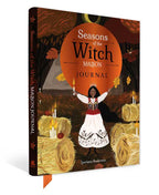 A hardcover journal titled "Seasons of the Witch Magon" by Lorriane Henderson, featuring an illustrated autumn scene with a witch in a white dress, candles, hay bales, and a large orange circle on the cover.