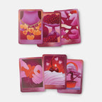 Six illustrated tarot-style cards arranged in two rows on a light gray background. The cards feature pink, magenta, and red tones with imagery including a heart pendant, berries, broken heart pieces, cherries, hands sewing, and a bonsai tree.