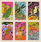 Set of six colorful cards featuring animals and people with psychedelic designs.