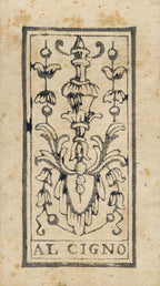 Decorative emblem with 'AL CIGNO' text on a beige background