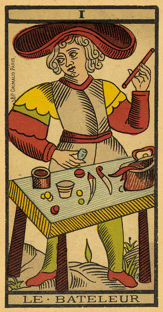 Vintage tarot card featuring a figure labeled 'Le Bateleur' with a table and tools.