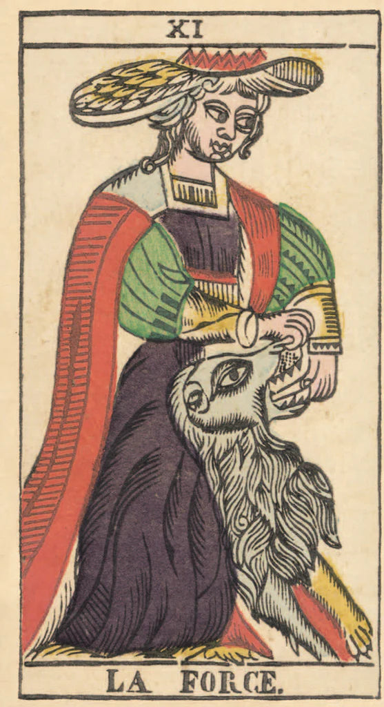 Card from a tarot deck featuring a figure with a headdress and a head, labeled 'La Force'.