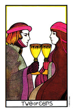 Two people holding cups with a colorful frame, labeled 'Two of Cups'.