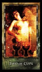 Tarot card titled 'Two of Cups' with a person holding two cups.