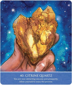 Citrine quartz crystal held in a hand with a starry night sky background