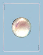 Round, iridescent object on a light blue background