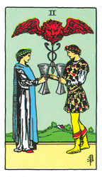 Two people holding hands with a red dragon above them on a tarot card.
