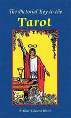 Book cover of 'The Pictorial Key to the Tarot' with a tarot card illustration on a blue background.