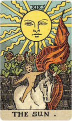 Tarot card featuring a sun with a face, a horse, and a child, labeled 'The Sun'.
