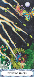 Card from a tarot deck featuring butterflies and staffs against a night sky.