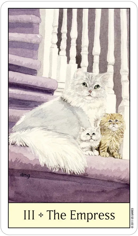 Card titled 'III + The Empress' featuring a white cat and two kittens on a purple couch.
