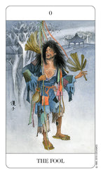 Tarot card featuring 'The Fool' with a character in a snowy landscape