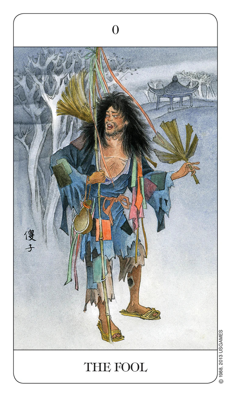 Tarot card featuring 'The Fool' with a character in a snowy landscape