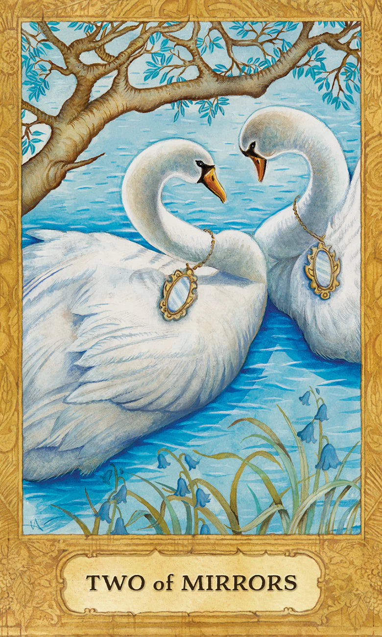 Two swans with mirror necklaces on a blue water background, framed by a gold border with 'Two of Mirrors' text.