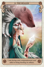 Card featuring a woman with a wolf and a glowing crystal, with text 'I am loving and compassionate and able to bring healing to others.'.