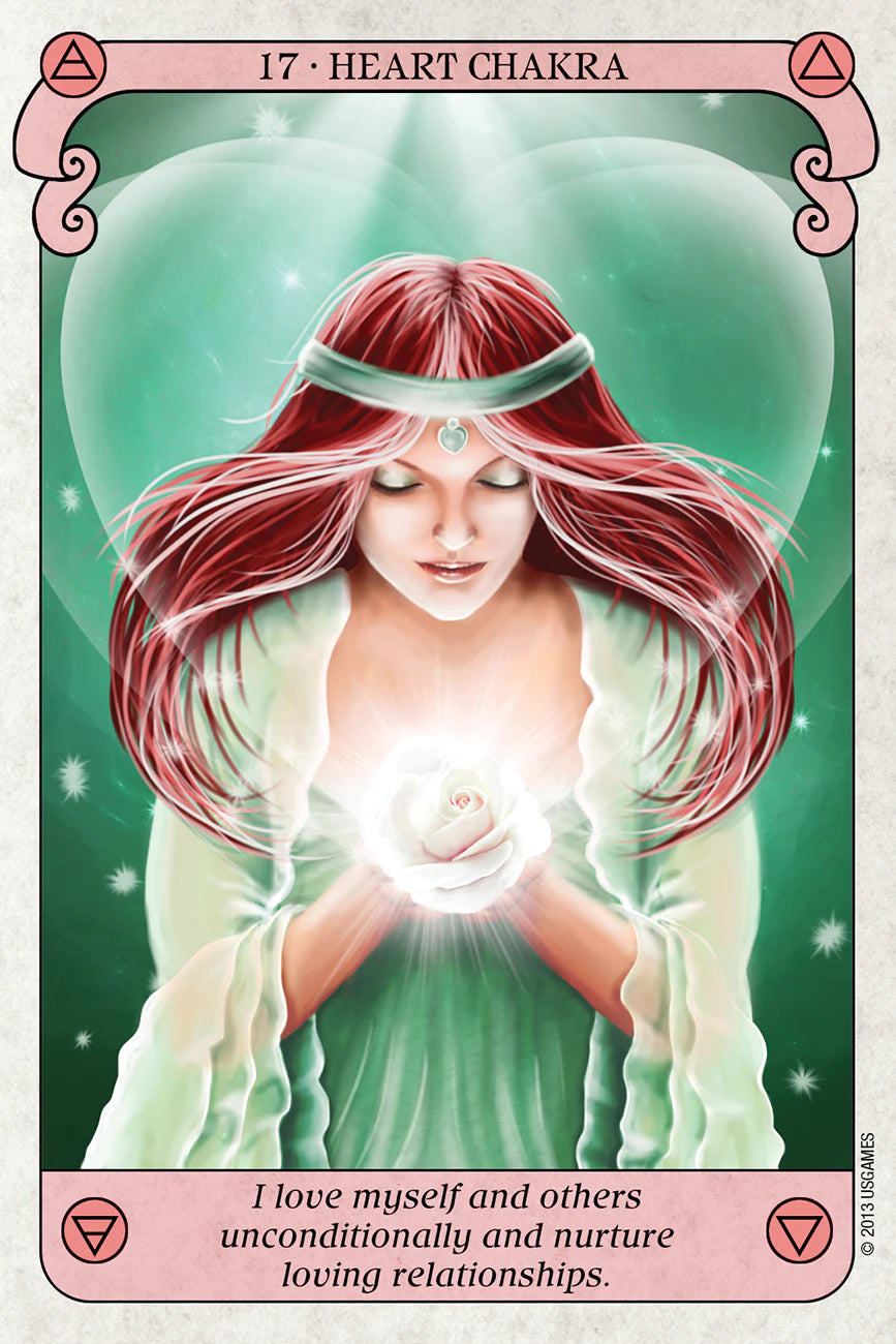 Card from a tarot deck featuring a woman with red hair holding a glowing rose, titled 'Heart Chakra'.