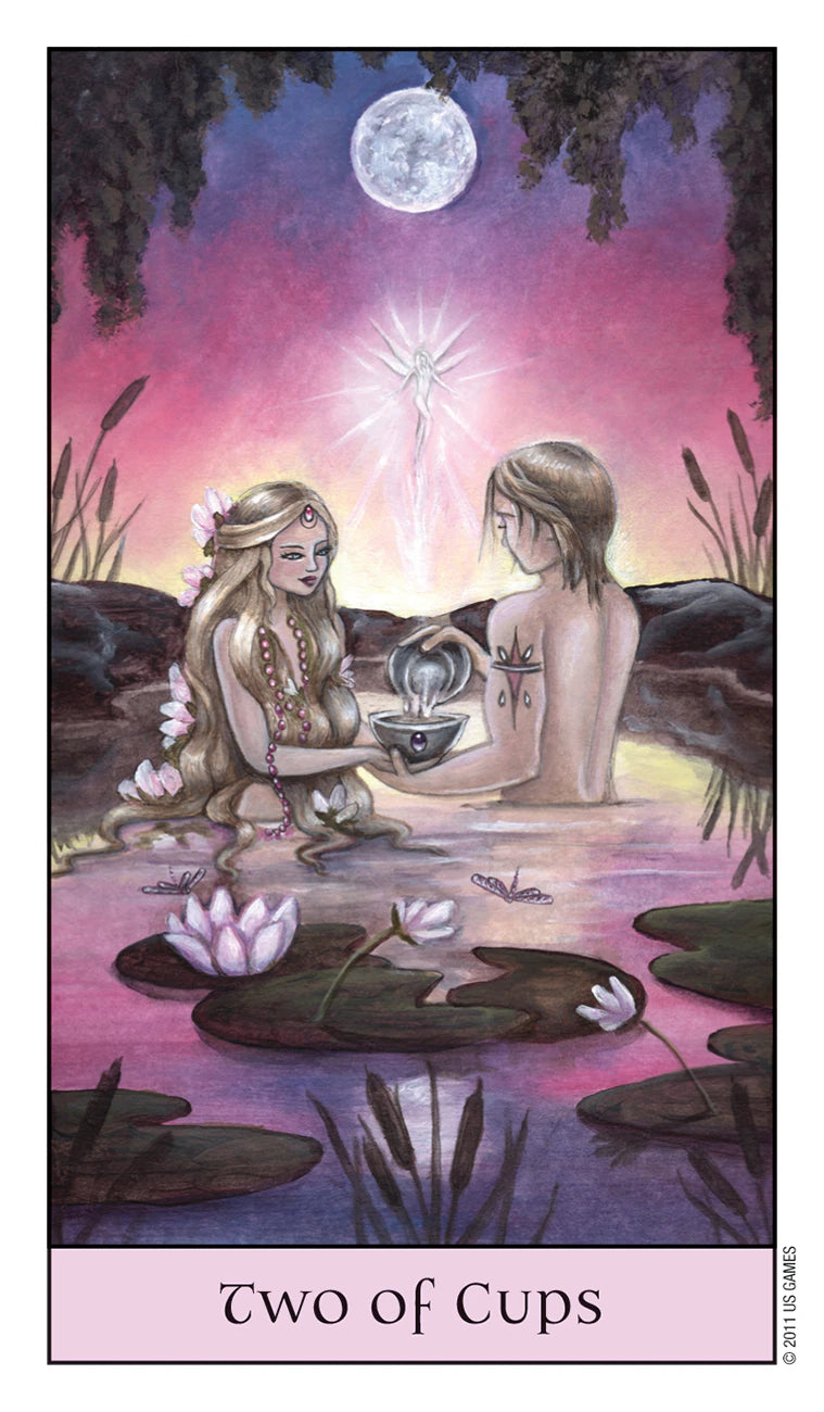 Two people sitting by a pool with a full moon and stars in the background, labeled 'Two of Cups'.