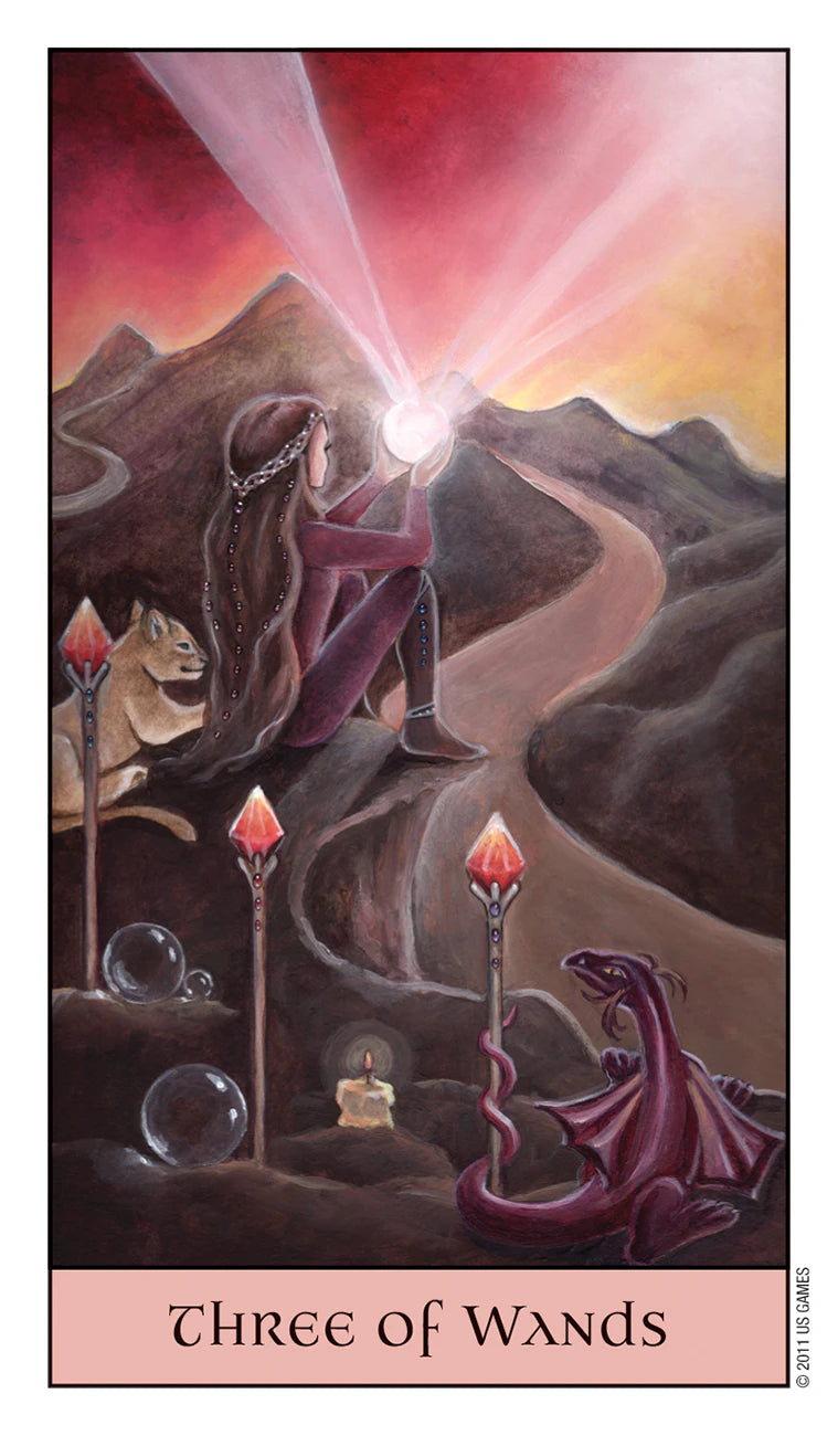 Tarot card titled 'Three of Wands' with a person holding a light, surrounded by wands and a dragon.