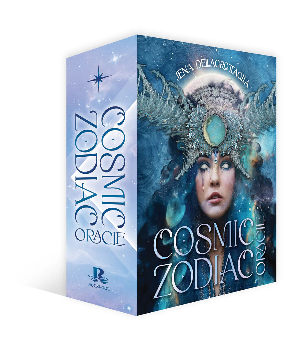 Boxed set of 'Cosmic Zodiac Oracle' with celestial design and woman's face on cover