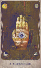 Tarot card with a hand holding a symbol against a dark background
