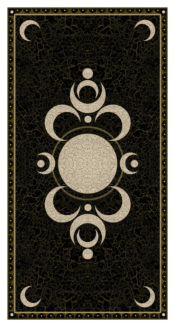 Decorative black and gold card with central circular design and moon symbols on a textured background