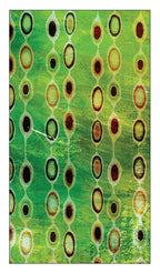 Patterned fabric with circular designs on a green background