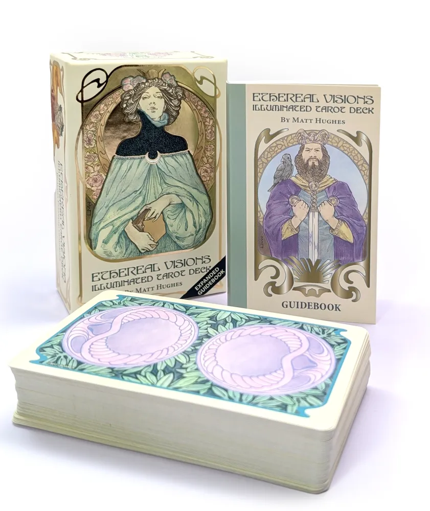 Ethereal Visions Illuminated Tarot Deck with packaging and guidebook on a white background