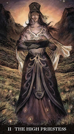 Tarot card featuring 'The High Priestess' with a woman in a detailed dress against a mountainous landscape.