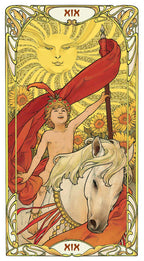 Tarot card featuring a figure with a red banner and a unicorn, with decorative elements and text at the top.