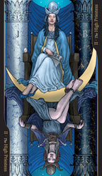 Tarot card featuring a figure in a blue robe sitting on a crescent moon with a castle in the background.