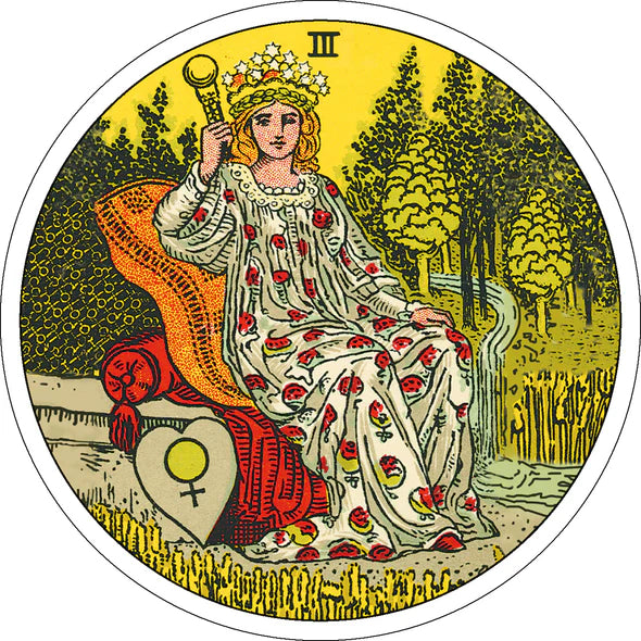 Tarot card with a figure in a floral dress holding a staff, surrounded by nature elements.