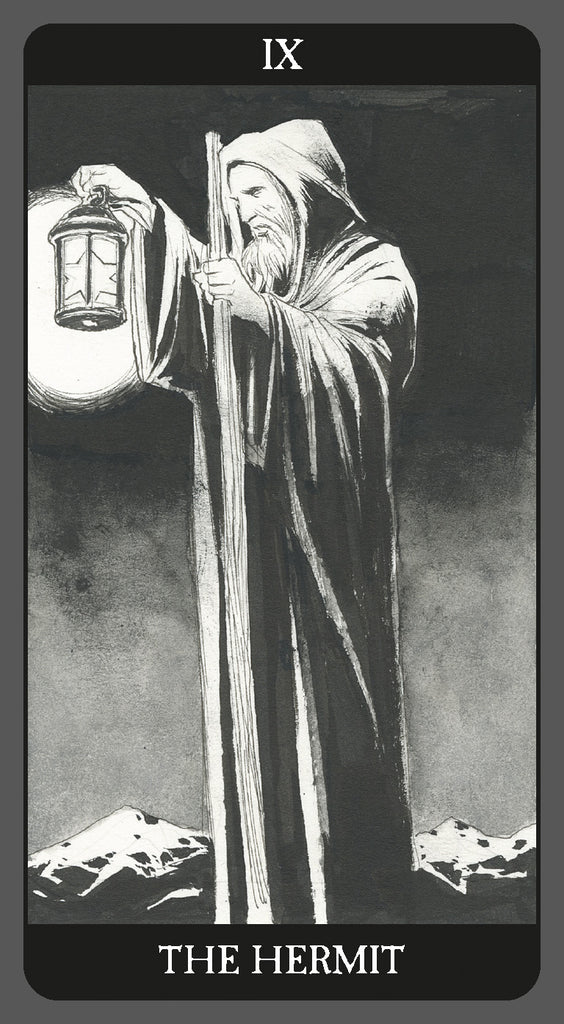 Tarot card featuring 'The Hermit' with a robed figure holding a lantern against a mountainous background.