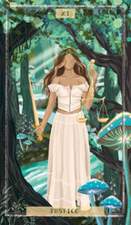 Tarot card featuring a figure holding scales and a sword in a forest setting, labeled 'Justice'.