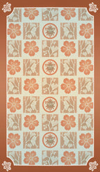 The back side of the Yokai Tarot - a patterned design with flowers and leaves.