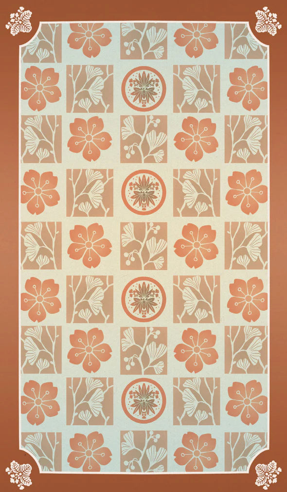 The back side of the Yokai Tarot - a patterned design with flowers and leaves.