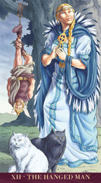 Tarot card featuring a figure with a blue robe, a white cat, and a black cat, with text 'XII The Hanged Man'.
