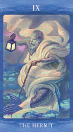 Tarot card featuring a figure with a lantern and fish, titled 'The Hermit'.