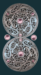 Two decorative circles on a green background. This is the back side of the Vikings Tarot