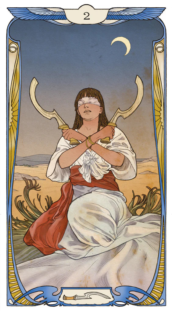 Tarot card with a figure holding two swords in a desert landscape, framed by decorative elements.