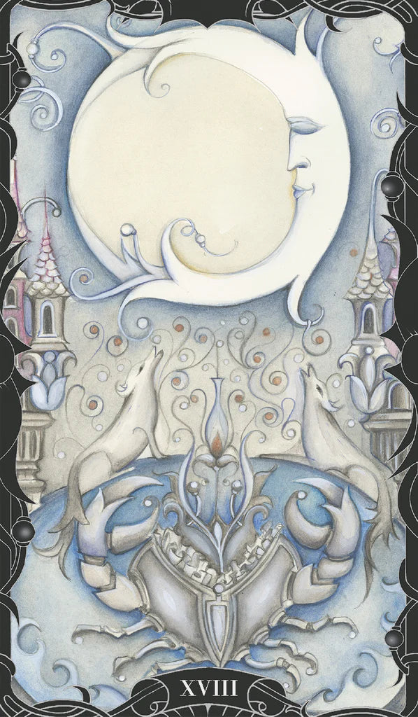 Decorative card with two dolphins, a moon, and intricate designs on a dark background