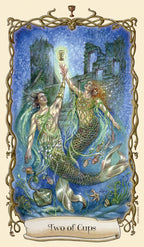 Two mermaids reaching towards each other with a blue background, labeled 'Two of Cups'.