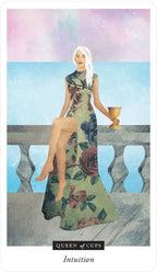 Card featuring a woman in a floral dress sitting on a bench with an hourglass, titled 'Queen of Cups'.