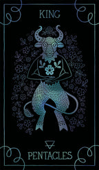 Tarot card featuring a bull with floral elements on a dark background, labeled 'King of Pentacles'.