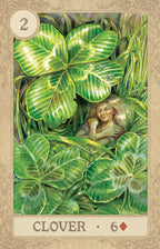 Card with a four-leaf clover and a person among leaves, labeled 'Clover 6'.
