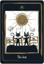 Tarot card titled 'The Sun' with black cats and a smiling sun.