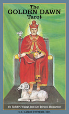 Book cover of 'The Golden Dawn Tarot' with a figure in red robes and a lamb on a green background.