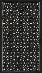 Black and white patterned rug with star-like shapes